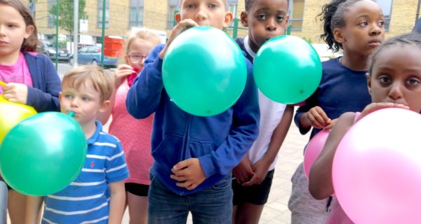 group of children with balloons