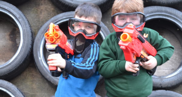 Two boys with water pistols
